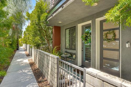 a porch of a house with a fence at 2 Mi to Beach Luxe LA-Area Townhome with Balcony in San Pedro