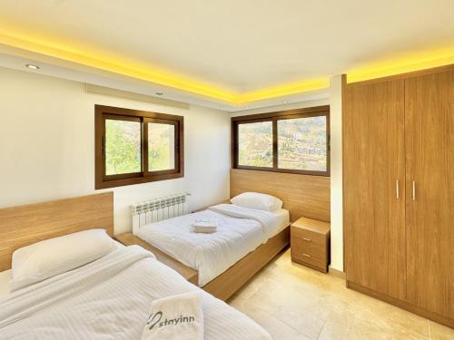 Postel nebo postele na pokoji v ubytování Capri - Duplex 3-BR in Faraya