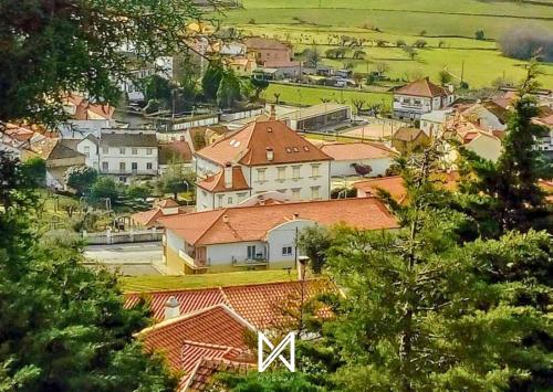 a view of a town with houses and trees at MyStay - Casa Aguarela in São Romão