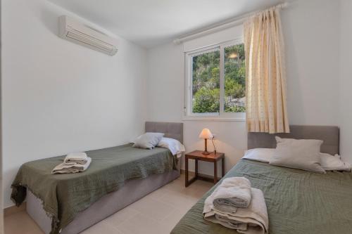 Ένα ή περισσότερα κρεβάτια σε δωμάτιο στο Infinity View Apartment Menorca