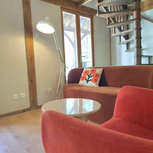Χώρος καθιστικού στο Gîte Rêve Vert with private pool and airco