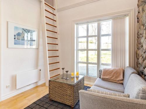 Posezení v ubytování 8 person holiday home in Løgstrup-By Traum