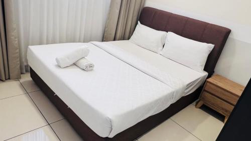 Ένα ή περισσότερα κρεβάτια σε δωμάτιο στο Trion KL Premium Residence