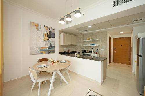 Η κουζίνα ή μικρή κουζίνα στο Studio Apartment - Yas Adventure by M