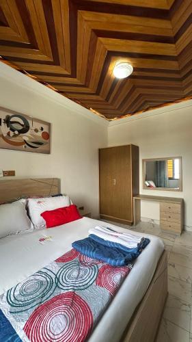 เตียงในห้องที่ Residence Le Sommet