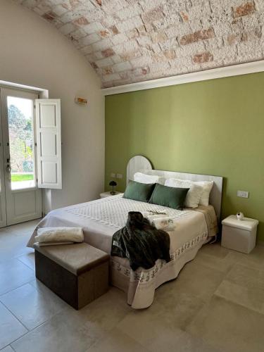 Postel nebo postele na pokoji v ubytování Villa Itriò - In the heart of Apulia - B&B - pool - rural experience