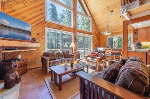 a living room with a couch and a table at Jester Court home in Tahoe Vista