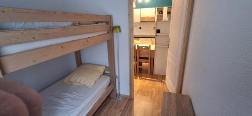 En eller flere senge i et værelse på Appartement Villar d'arène