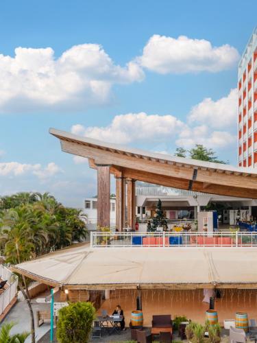 a pavilion on the roof of a building at Hotel Arawak Beach Resort in Le Gosier