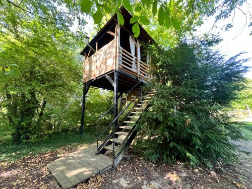 Jardín al aire libre en Cabane Dans Les Arbres Avec Bain Nordique