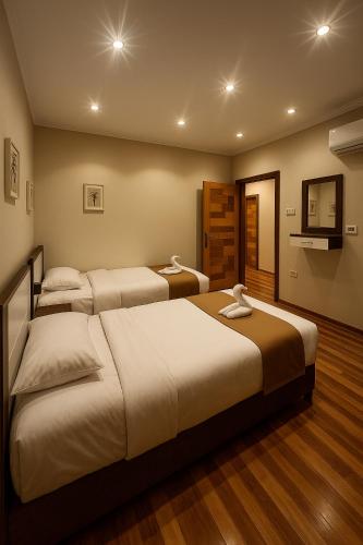 Una cama o camas en una habitación de Pyramids Holiday Escape