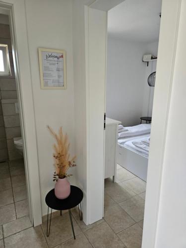 Katil atau katil-katil dalam bilik di Mala Smokva Apartments Vir Prezida