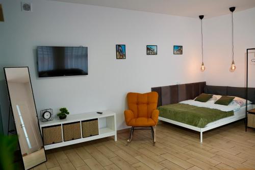 Ένα ή περισσότερα κρεβάτια σε δωμάτιο στο Apartament Murowa