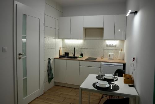 Η κουζίνα ή μικρή κουζίνα στο Apartament Murowa