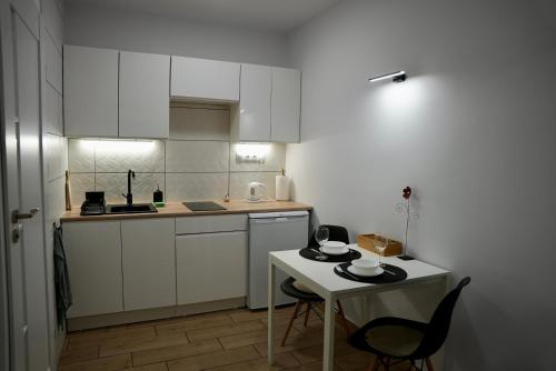 Η κουζίνα ή μικρή κουζίνα στο Apartament Murowa