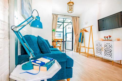 Μια τηλεόραση ή/και κέντρο ψυχαγωγίας στο Bijou Retreat 2 mins from Beach