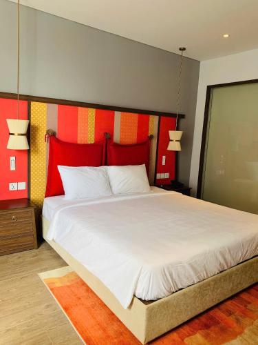 Postel nebo postele na pokoji v ubytování Condotel Highfloor Sea View - Apec Mandala Mui Ne