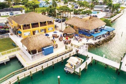 an aerial view of a house on the water at Modern and comfortable new home with hot tub in Fort Pierce