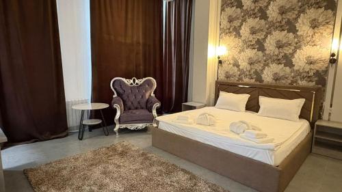Ένα ή περισσότερα κρεβάτια σε δωμάτιο στο Elite Hotel
