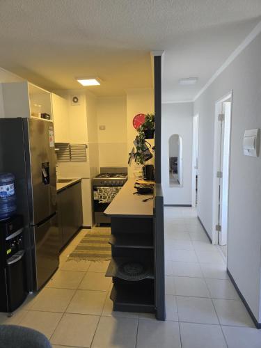 Cucina o angolo cottura di Céntrico 2 habitaciones camas matrimoniales -1 baño parking privado calefacción AC