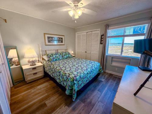 Postel nebo postele na pokoji v ubytování Inlet Point Villas 2A