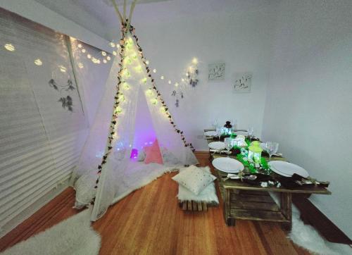 a room with a tent in the corner of a room at Private Airconditioned 2 Bedroom Home Private Parking in Burnaby