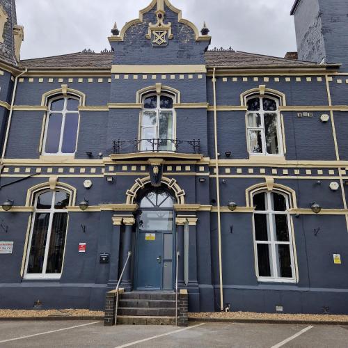 a blue building with a star on top of it at The Dorchester Hotel & serviced apartments in Hull