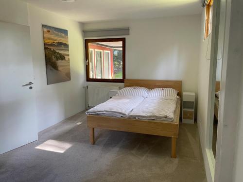 Giường trong phòng chung tại Schwedenhaus in Sandhatten