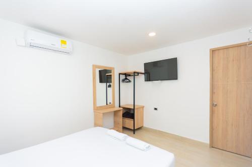 Μια τηλεόραση ή/και κέντρο ψυχαγωγίας στο Hotel Villa Real 70 Laureles