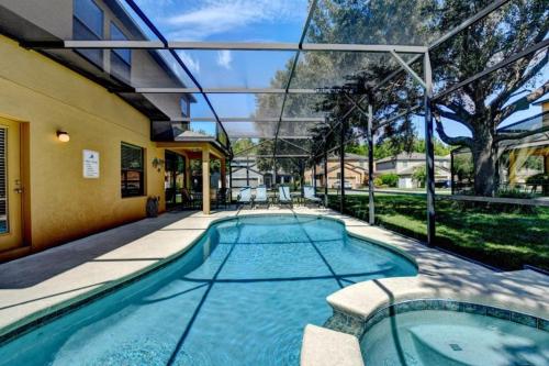 Πισίνα στο ή κοντά στο Spacious 6BR Villa with Private Pool –Near Disney villa