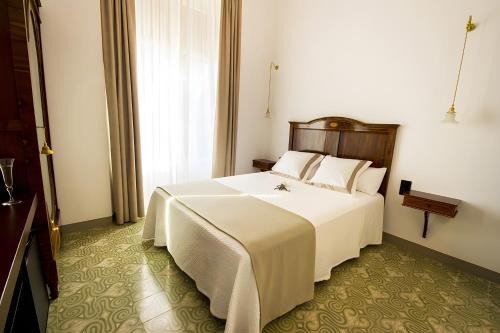 Ένα ή περισσότερα κρεβάτια σε δωμάτιο στο Habitacion Camagroc