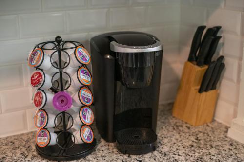 a coffee maker sitting on top of a counter at 3 Bed 1 5 Bath Home in College Hill By Hospital in Wichita