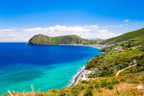 a view of a beach and the ocean at B&B Salty Mermaid in Tropea