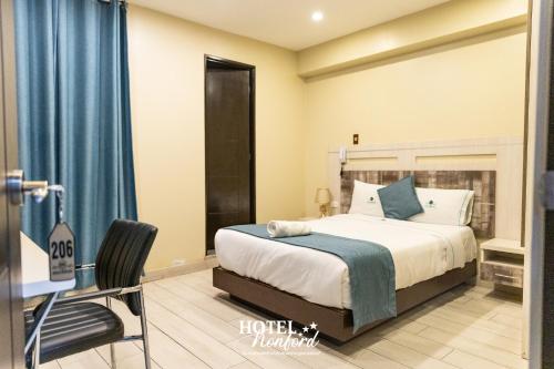 Postel nebo postele na pokoji v ubytování Hotel Konford Cañete