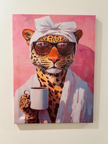 a painting of a cheetah wearing sunglasses and holding a cup at Cosy Room in North Ryde #2 in Sydney