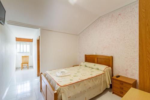 Postel nebo postele na pokoji v ubytování Hostal Sequeiros