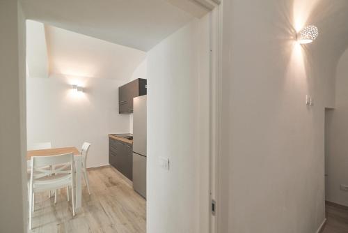 Μια τηλεόραση ή/και κέντρο ψυχαγωγίας στο Suite n8 - Accogliente appartamento nel centro