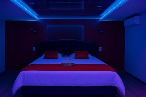 Postel nebo postele na pokoji v ubytování Suite Romantique - Nature & Spa