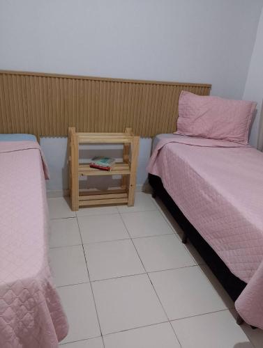 Katil atau katil-katil dalam bilik di Recanto dos Ouros - Casa em Brasília com churrasqueira e localização privilegiada