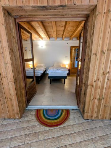 Ένα ή περισσότερα κρεβάτια σε δωμάτιο στο Oxxy Casa - Gîte de 14 personnes