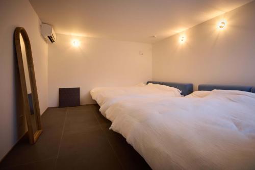 Кровать или кровати в номере tuuli YUFU Kei-KEI- [Leisurely] - Vacation STAY 52352v