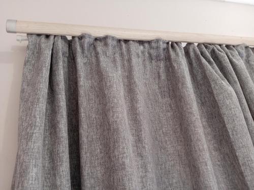 a curtain rod hanging from a wall at Happiness Gardens in Lilongwe