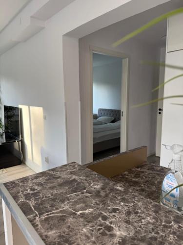 Postel nebo postele na pokoji v ubytování Bota apartment