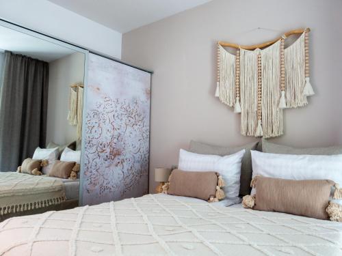 a bedroom with a large mirror and a bed at La Bella Riva in Sarnico