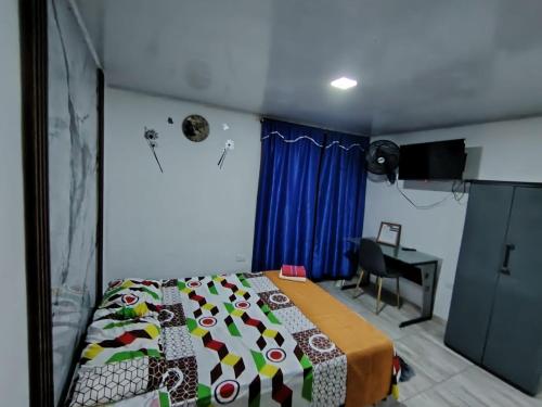 Postel nebo postele na pokoji v ubytování Apartaestudio para estrenar La Quinta