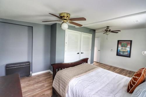 a bedroom with a bed and a ceiling fan at Luxurious 3 Bedroom, 3 Bathroom, Entire Home in Catskill in Catskill