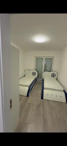 Postel nebo postele na pokoji v ubytování Apapartament extra