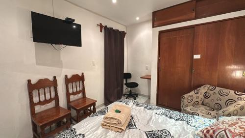 Ένα ή περισσότερα κρεβάτια σε δωμάτιο στο Habitación a 5 minutos del AICM
