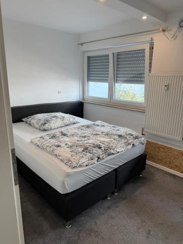 Postel nebo postele na pokoji v ubytování Schönblick