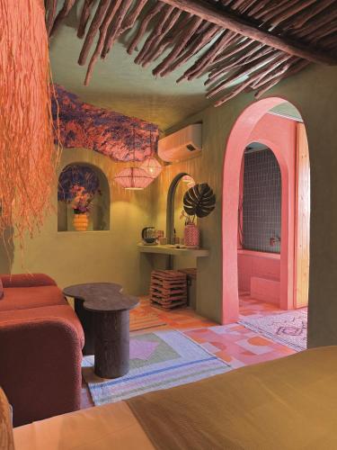 a living room with a couch and a table at Casa Amina in Chefchaouene